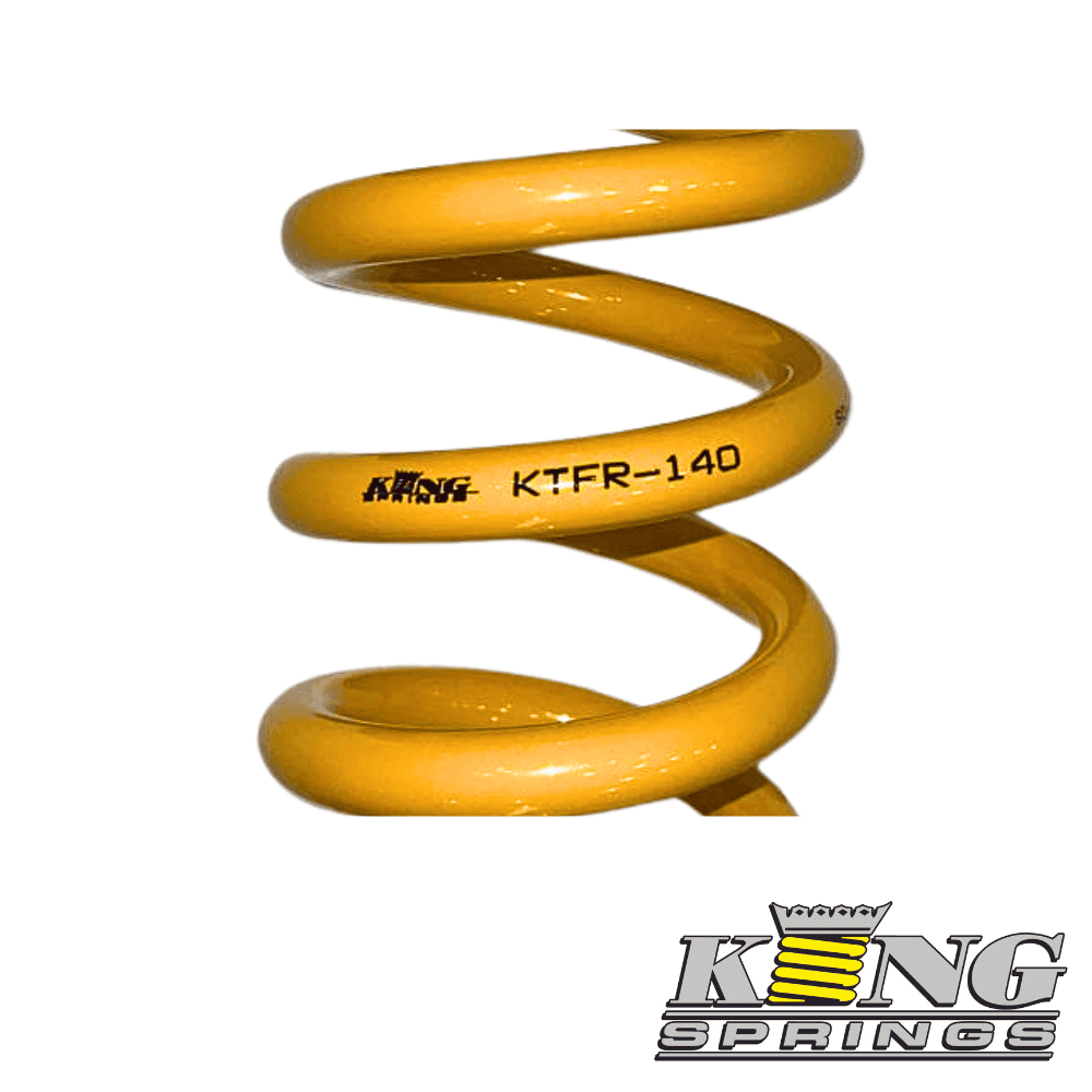 Heavy-duty yellow coil spring for industrial or automotive applications.