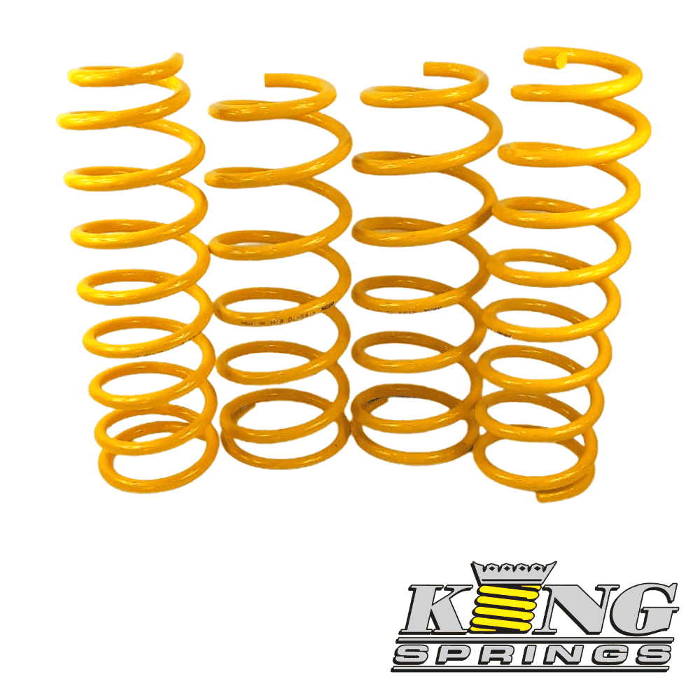 Yellow coil springs for automotive suspension from Al Shiba General Trading.