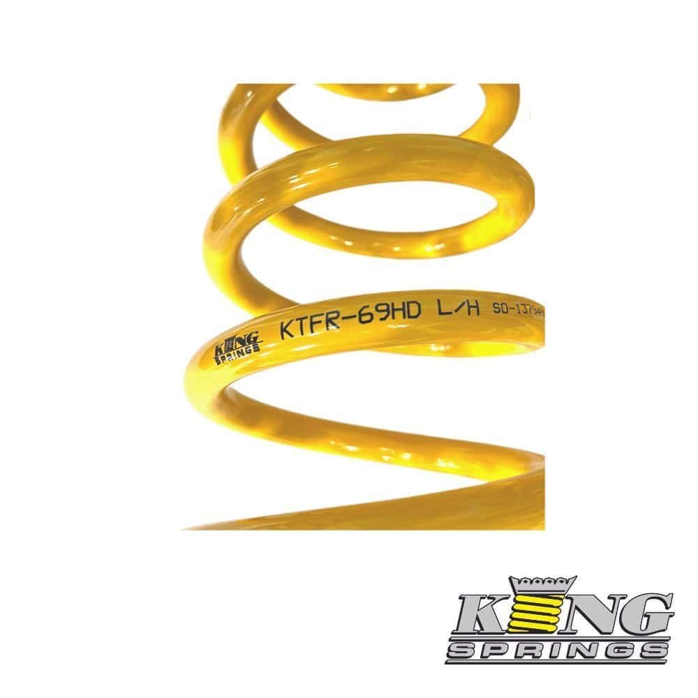 High-quality yellow coil spring for industrial and automotive applications. Durable and reliable sus.