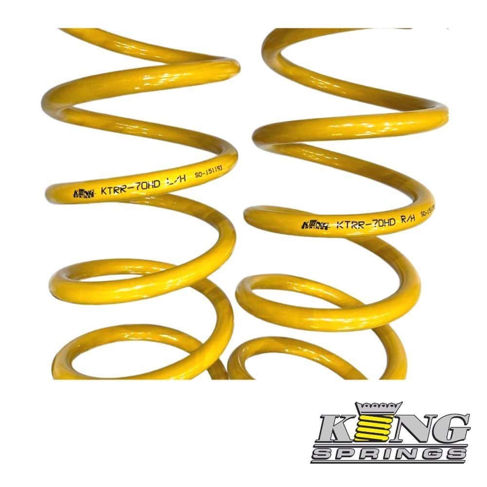 High-quality yellow coil springs for automotive suspension systems. Durable and reliable for optimal.