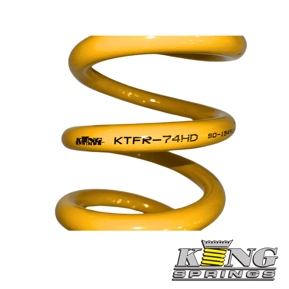 High-quality yellow coil spring for industrial and automotive applications.