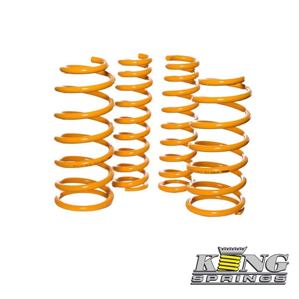 High-quality orange coil springs for automotive suspension systems.