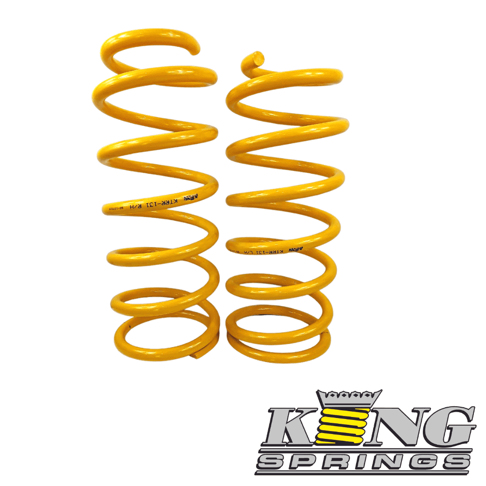 Heavy-duty yellow coil springs for automotive suspension systems.