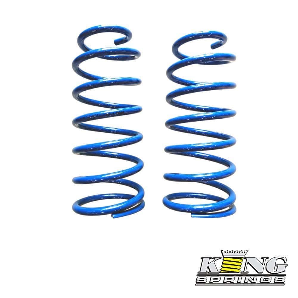 Blue coil springs for automotive suspension, high-quality shock absorber parts.