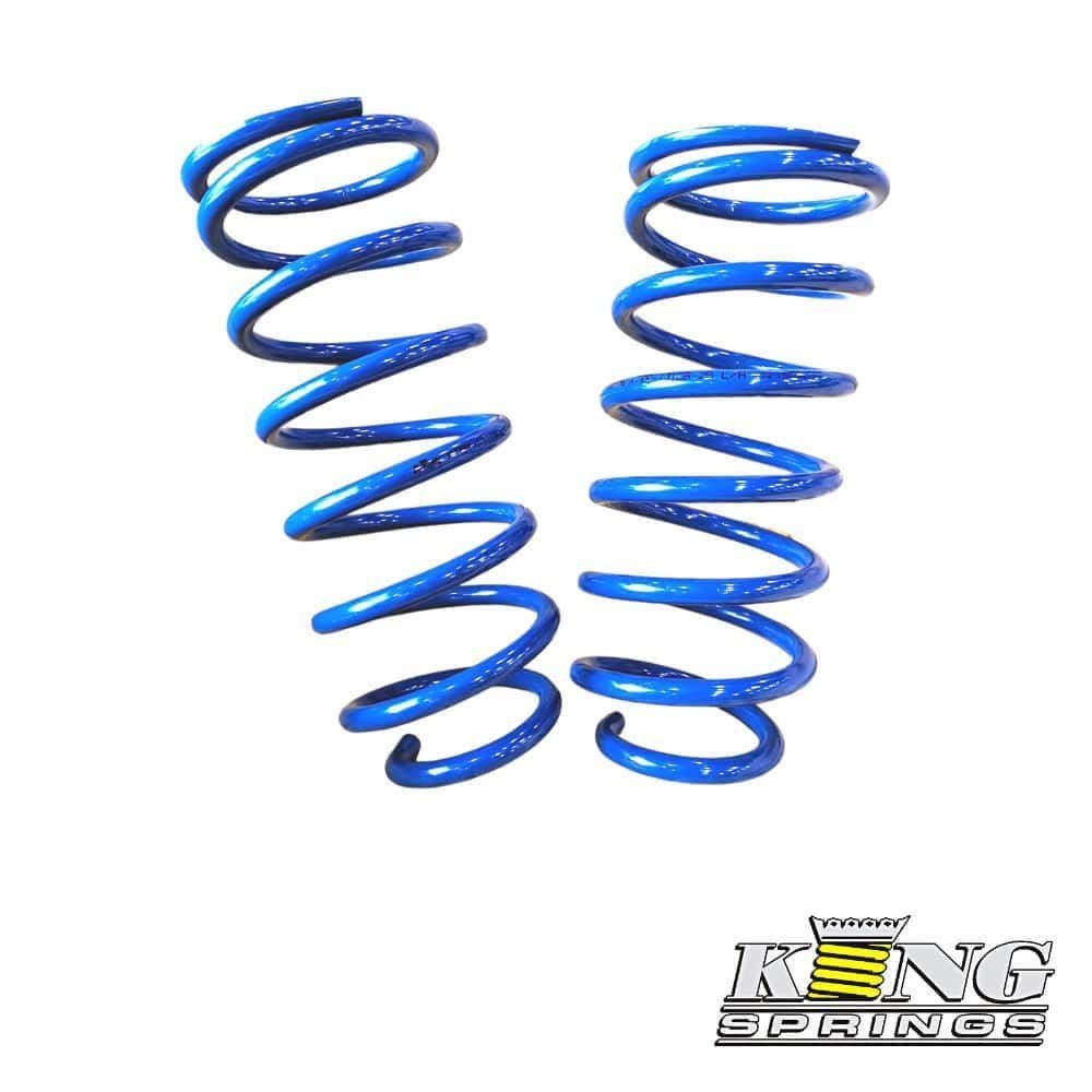 Blue coil springs for automotive suspension, high-quality shock absorber components.