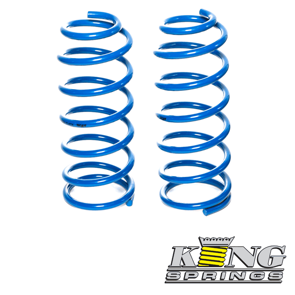 Blue coil springs for automotive suspension, high-quality shock absorbers.