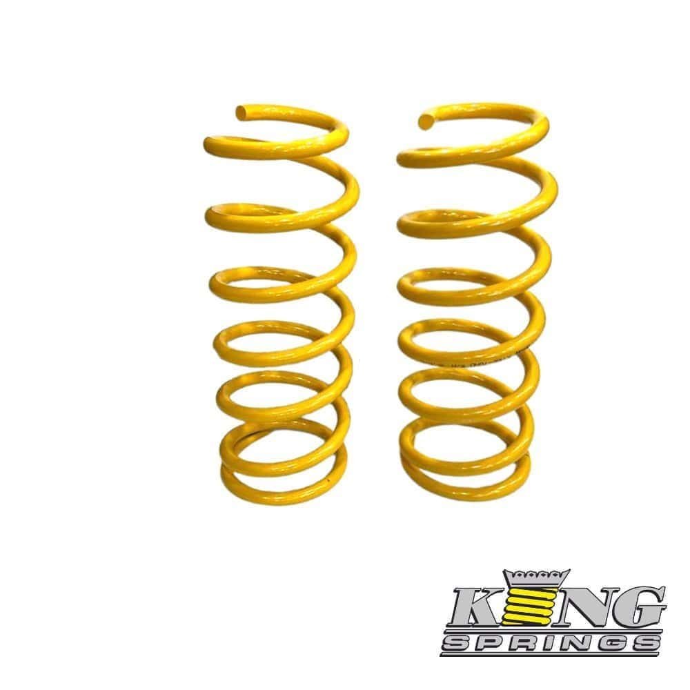 Yellow coil springs for industrial or automotive use, high-quality and durable.