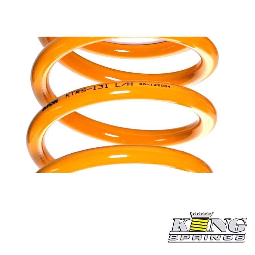 High-quality orange coil spring for industrial and automotive applications.
