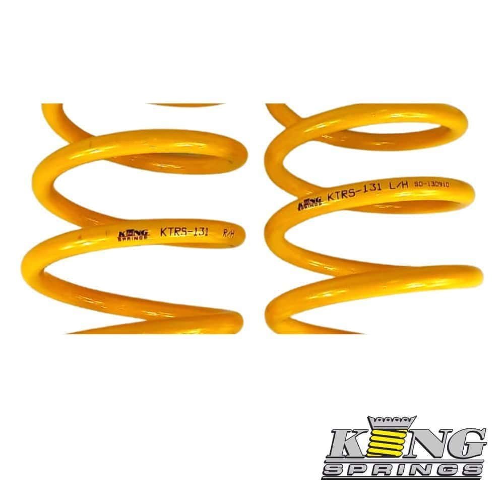 High-quality yellow coil springs for automotive suspension systems.
