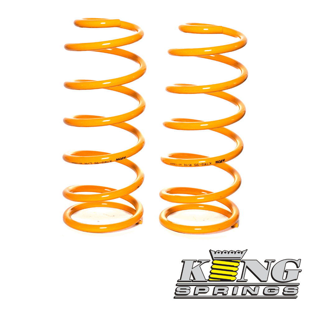 Orange coil springs for automotive suspension systems.