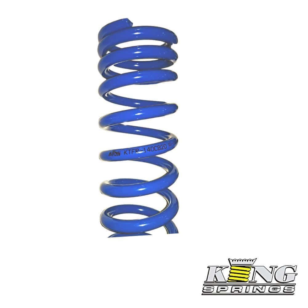 Blue coil spring for industrial or automotive use.