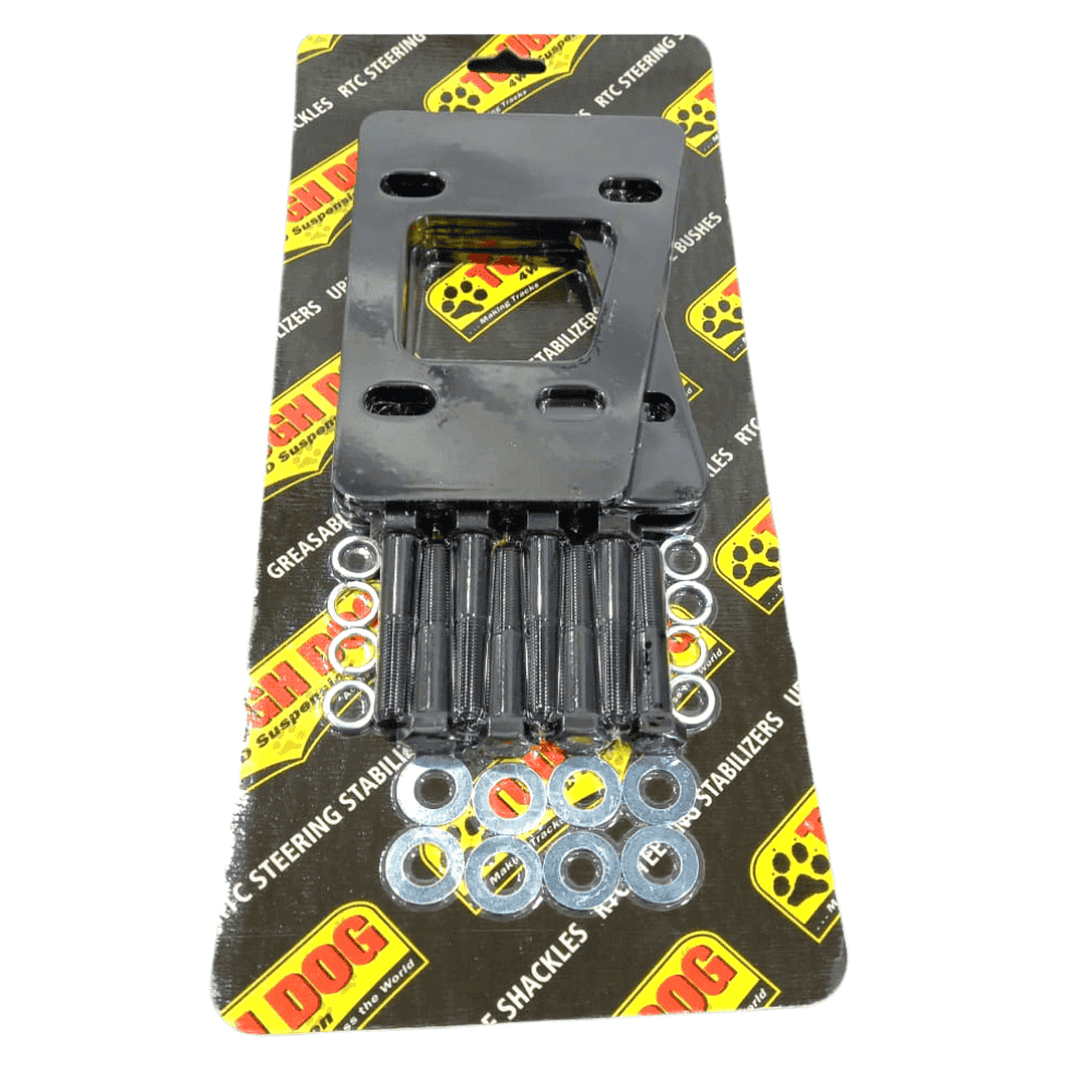 Heavy-duty steering rack mount kit with bolts and washers for vehicle stability.