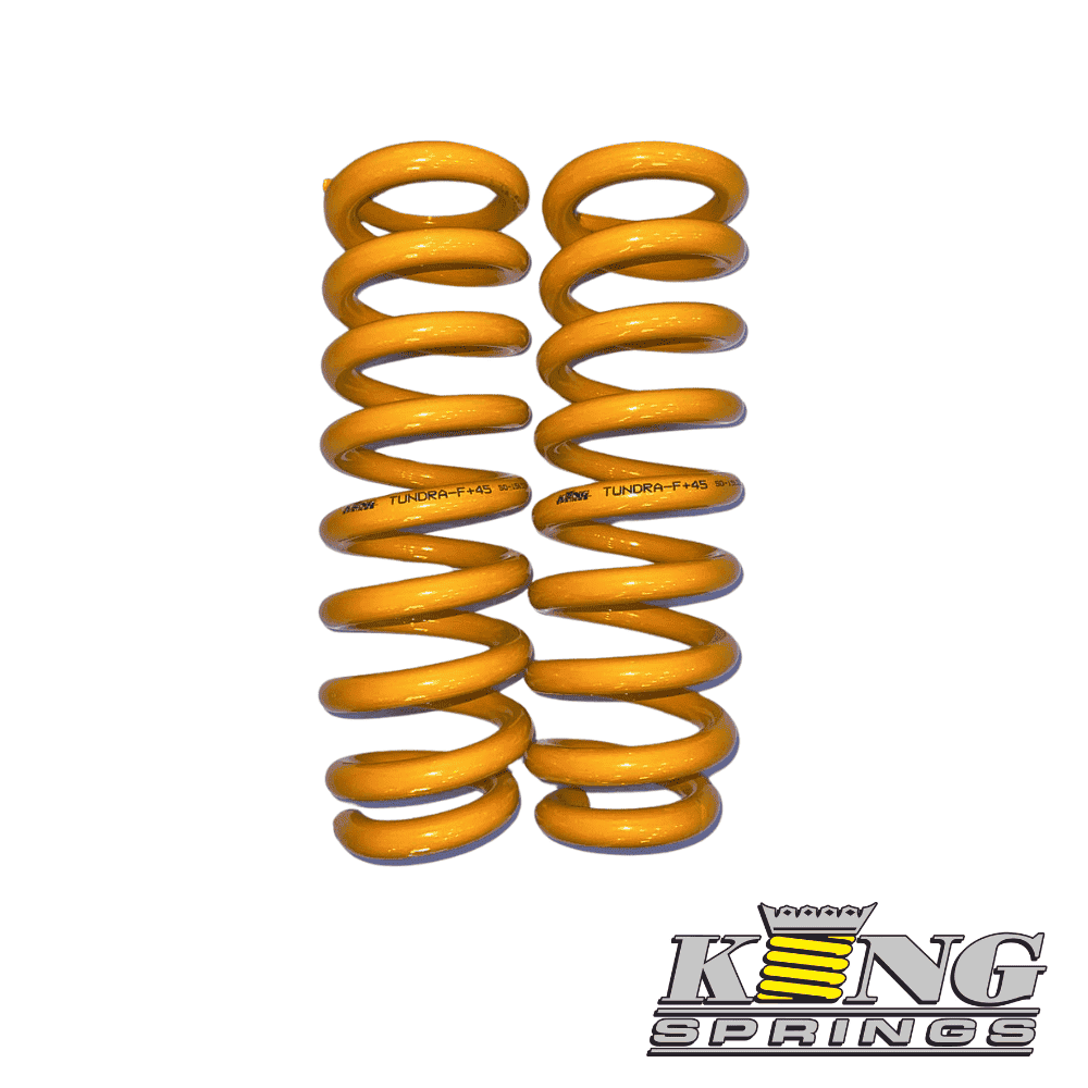 High-performance yellow coil springs for vehicle suspension systems.