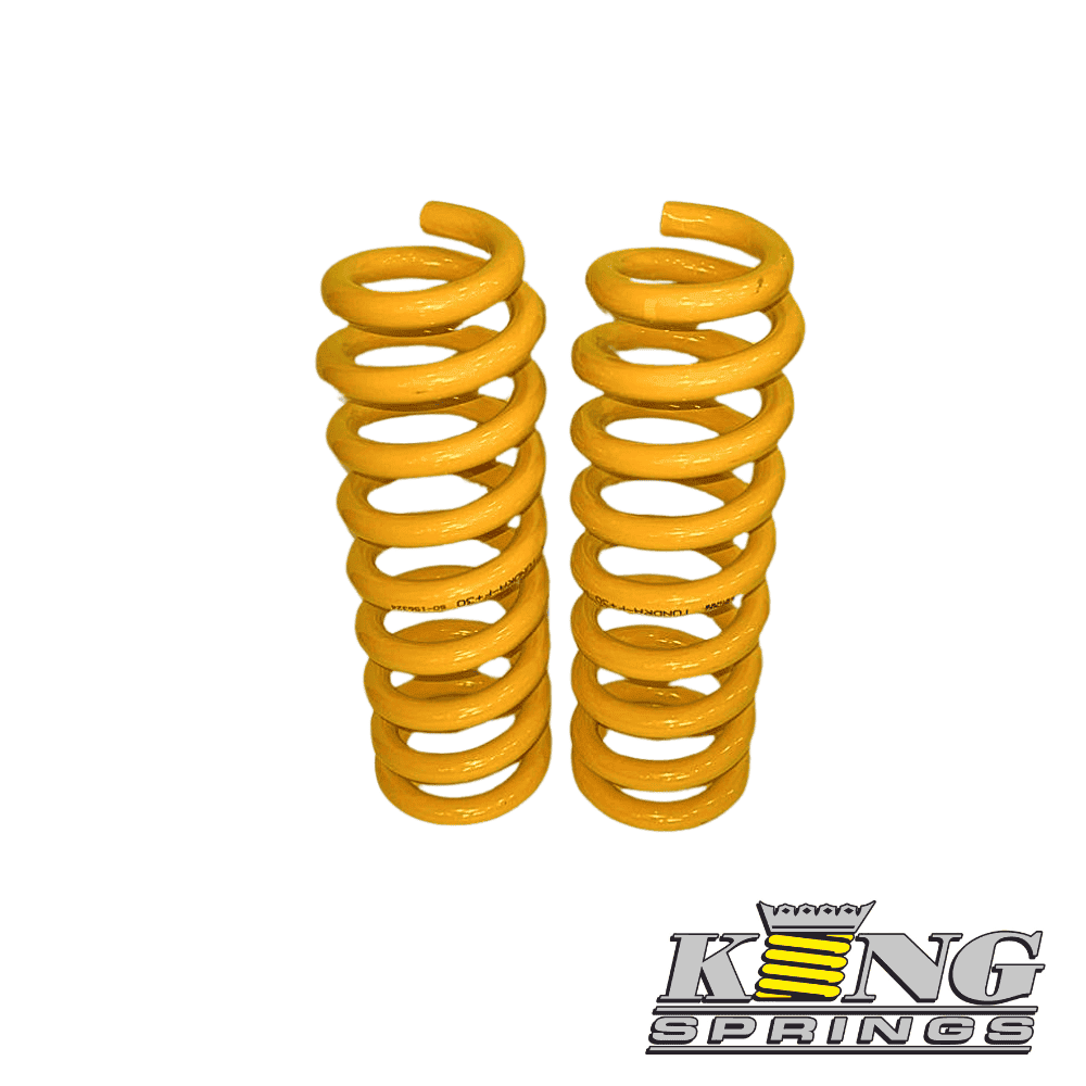 High-quality yellow coil springs for automotive suspension systems.