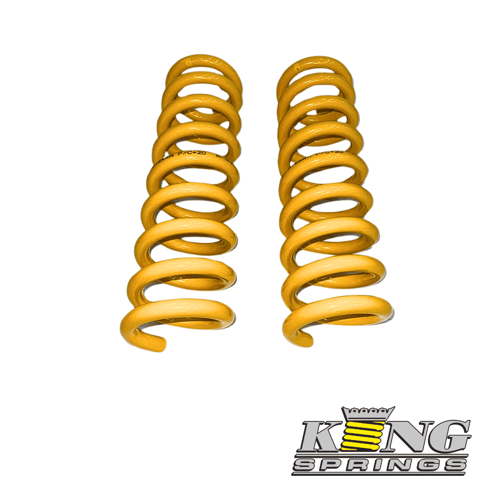 High-quality yellow coil springs for automotive suspension systems.