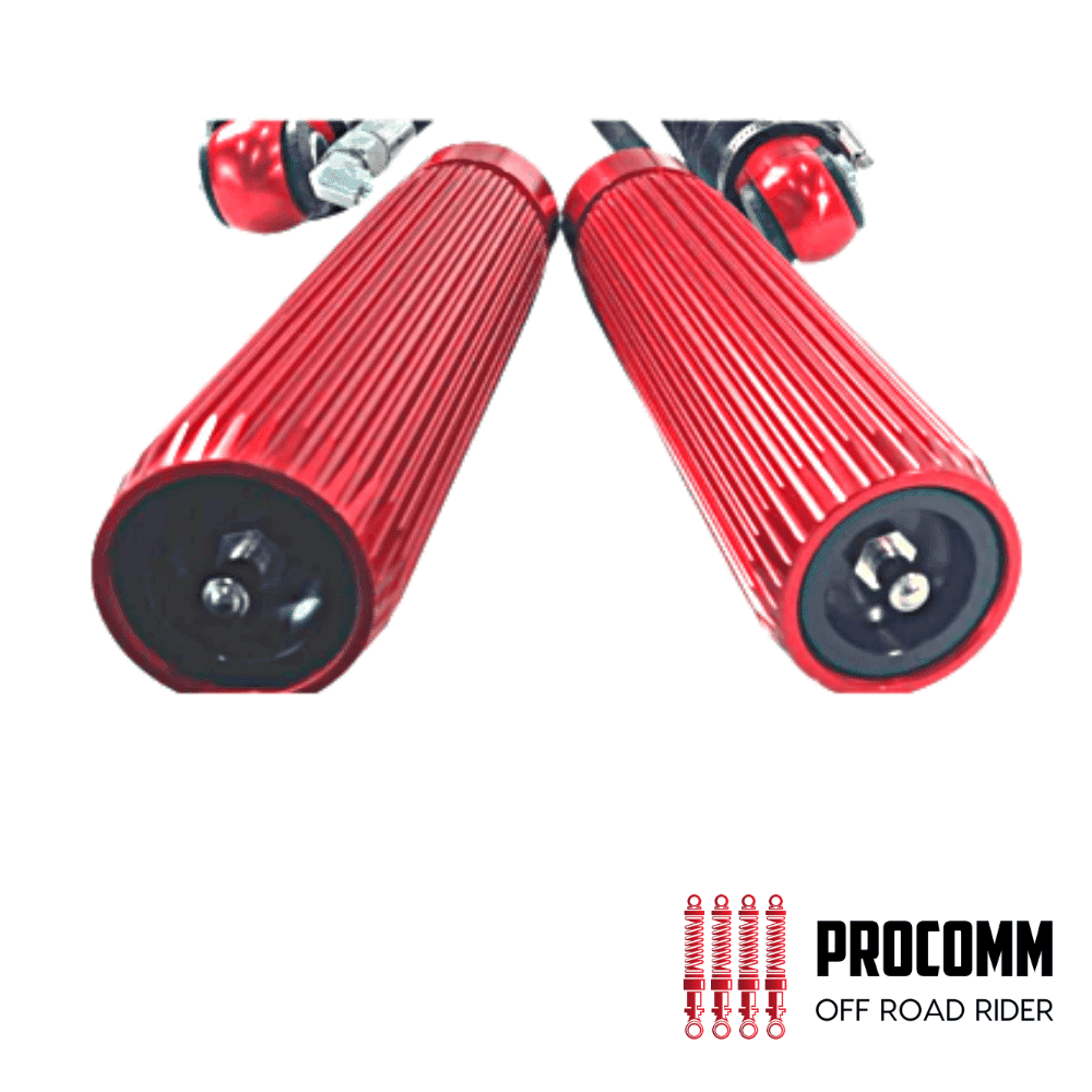 Red motorcycle handlebar grips for off-road riding, branded PROCOMM.
