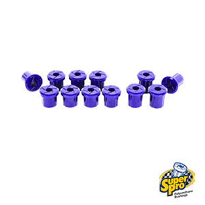 Purple polyurethane bushings arranged in a row on a white background; automotive suspension components with Super Pro logo in the bottom-right corner