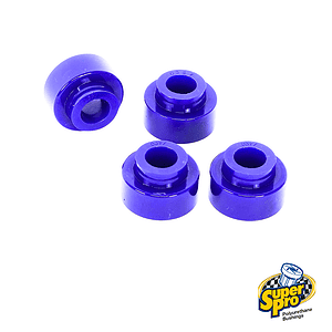 Four blue polyurethane bushings with hollow centers, used in vehicle suspension components