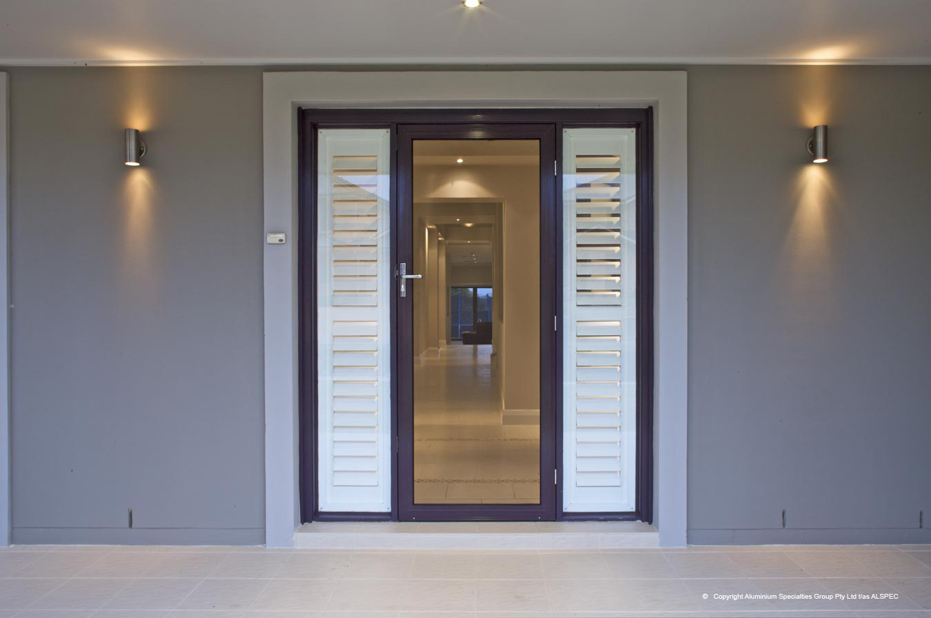 Hinged security screen door with louvred sidelights; Alspec photograph