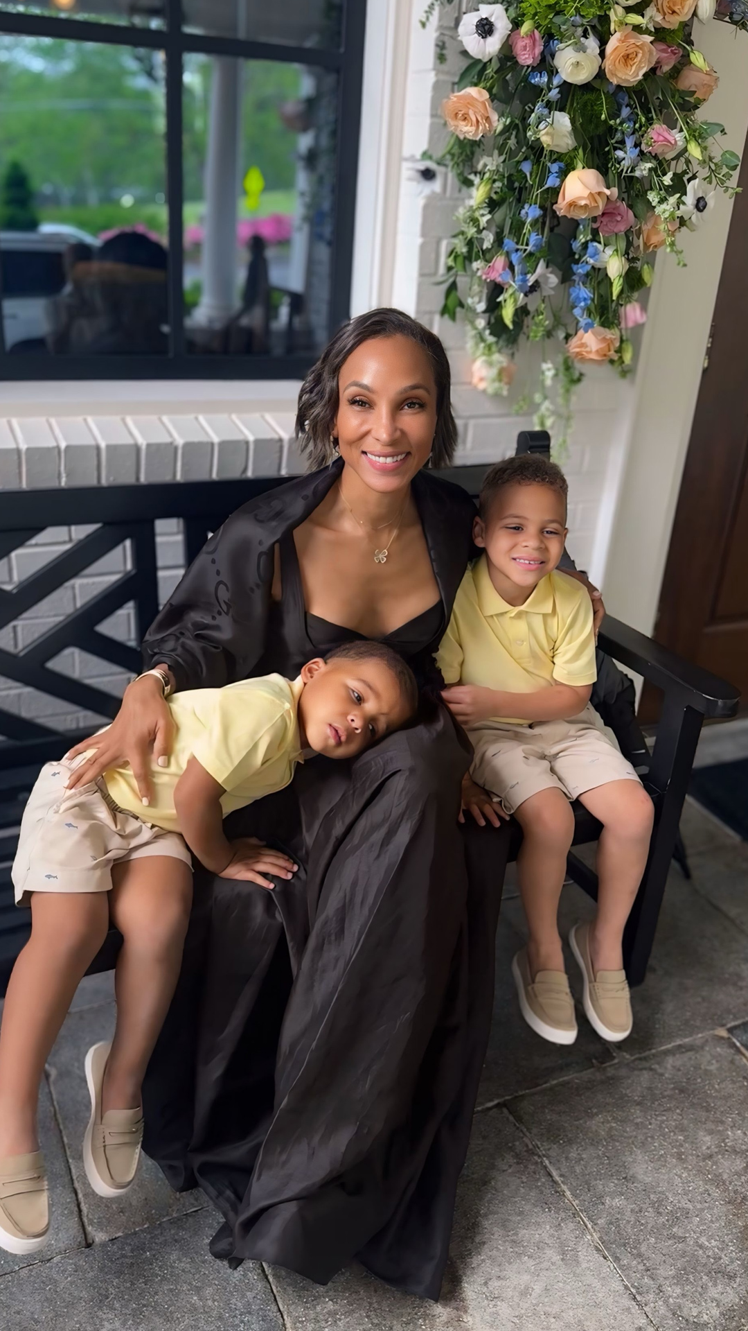 Dr. Johnson in black dress on front porch on Instagram