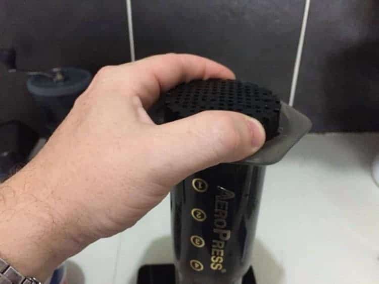 Screwing on Aeropress cap piece 