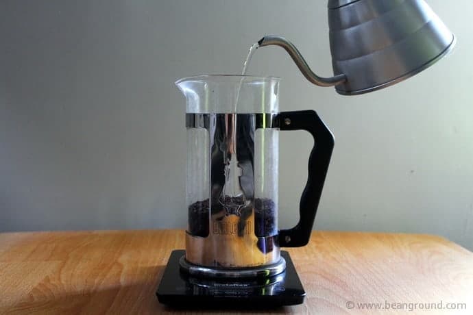 Pouring water into a French Press 