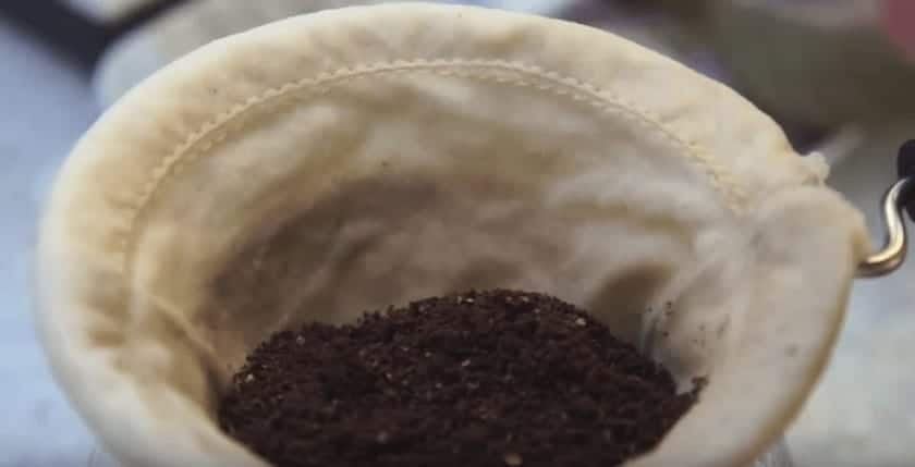 ground coffee inside of a sock 