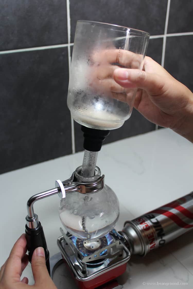 set the top section into the glass bulb 