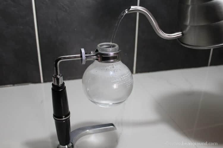 pour water into the glass bulb