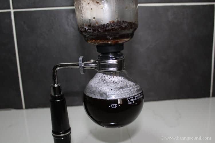 watch the coffee drop down into the bottom chamber