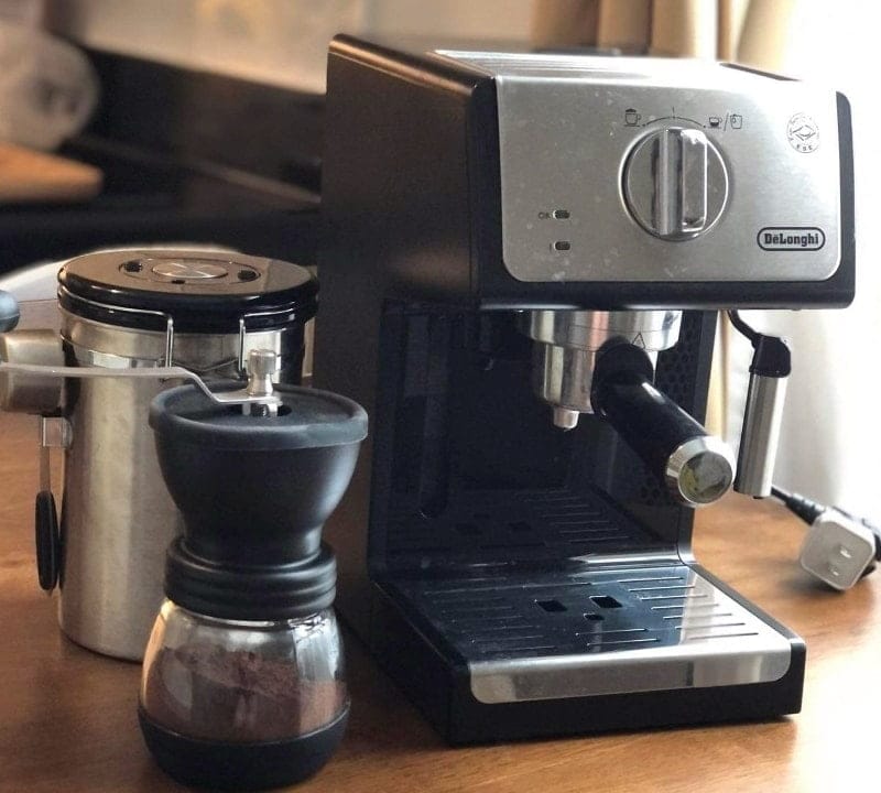 delonghi espresso machine review on table with grinder