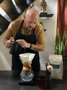Barista and licensed Q Grader Mark Morphew pouring Chemex coffee in Bali, Indonesia