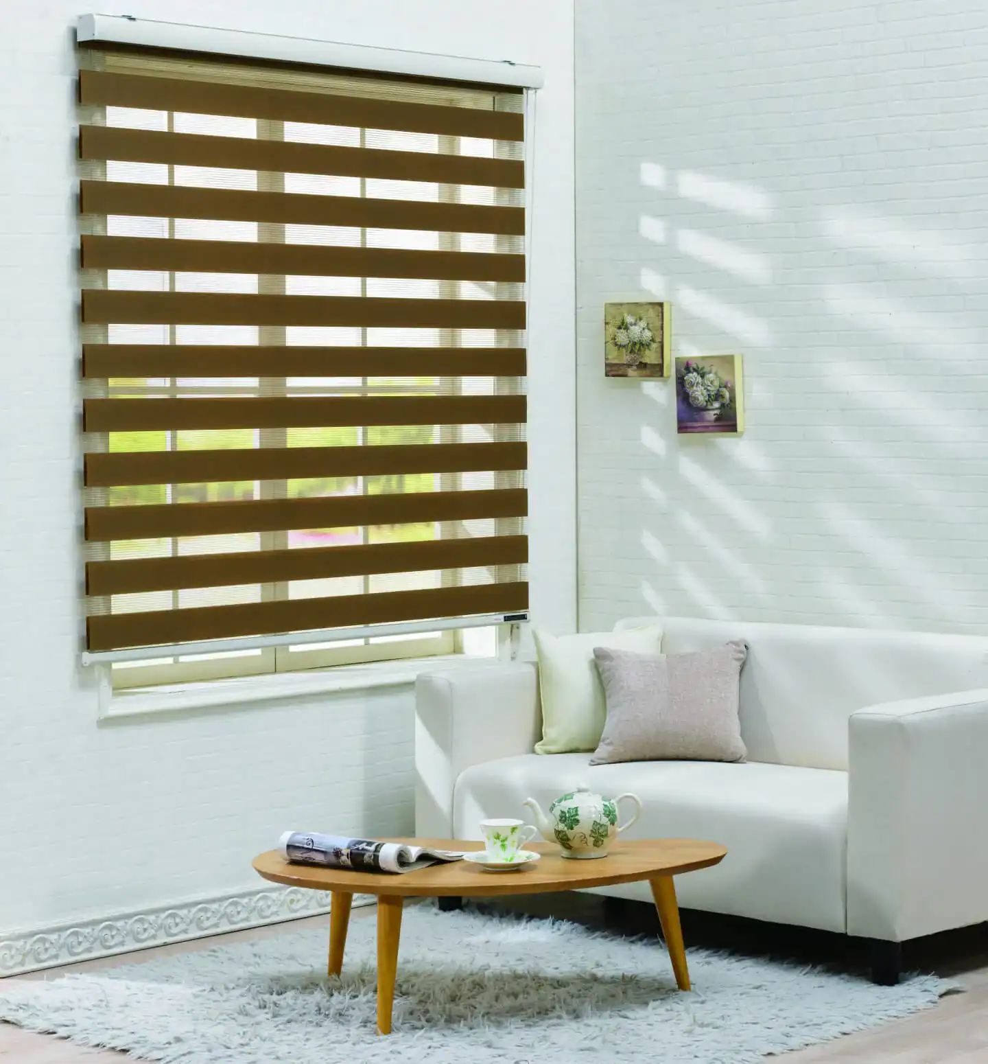 Elegant window blinds with alternating brown stripes in a stylish living room setting.