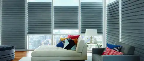 Bright, airy living room with floor-to-ceiling windows and contemporary decor.