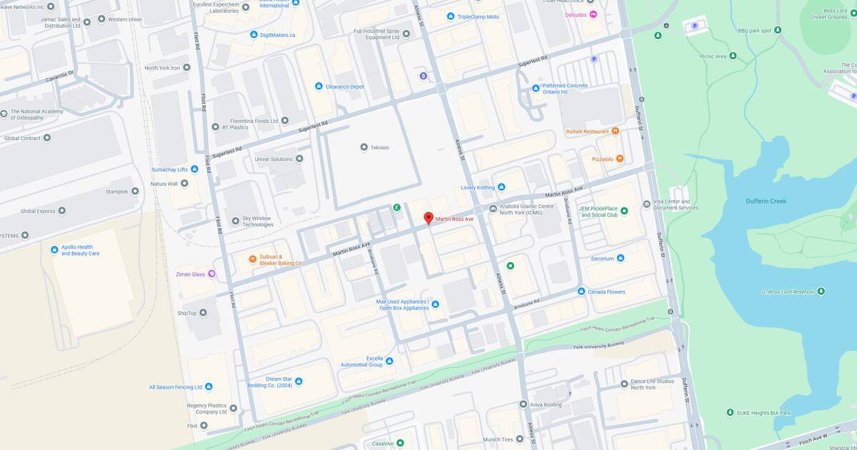 City neighborhood map with streets, parks, and a lake.