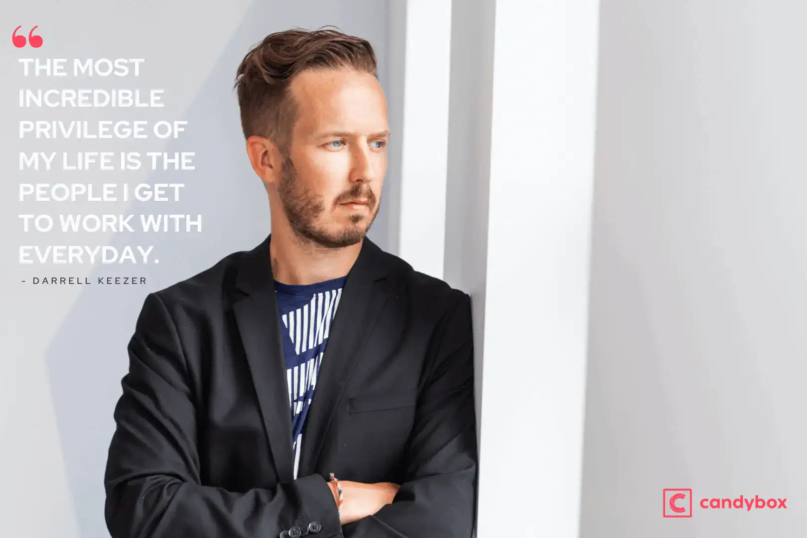 Darrell keezer leaning against wall with a quote in text