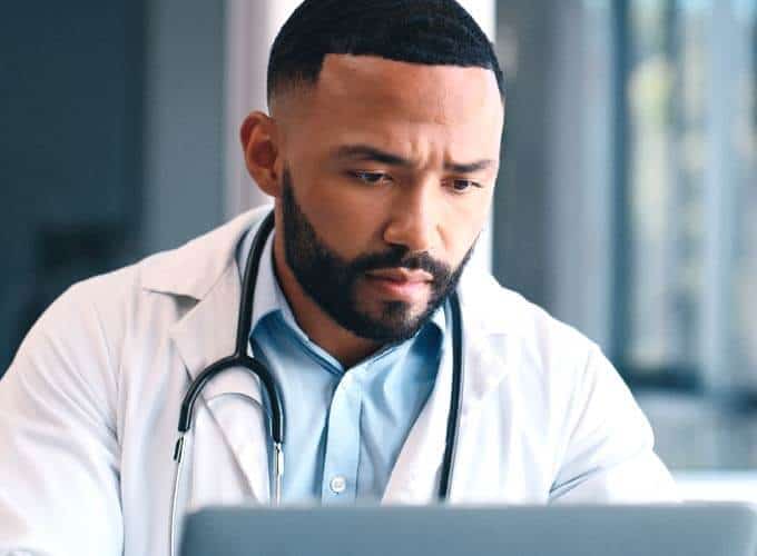 doctor and laptop for hospital planning
