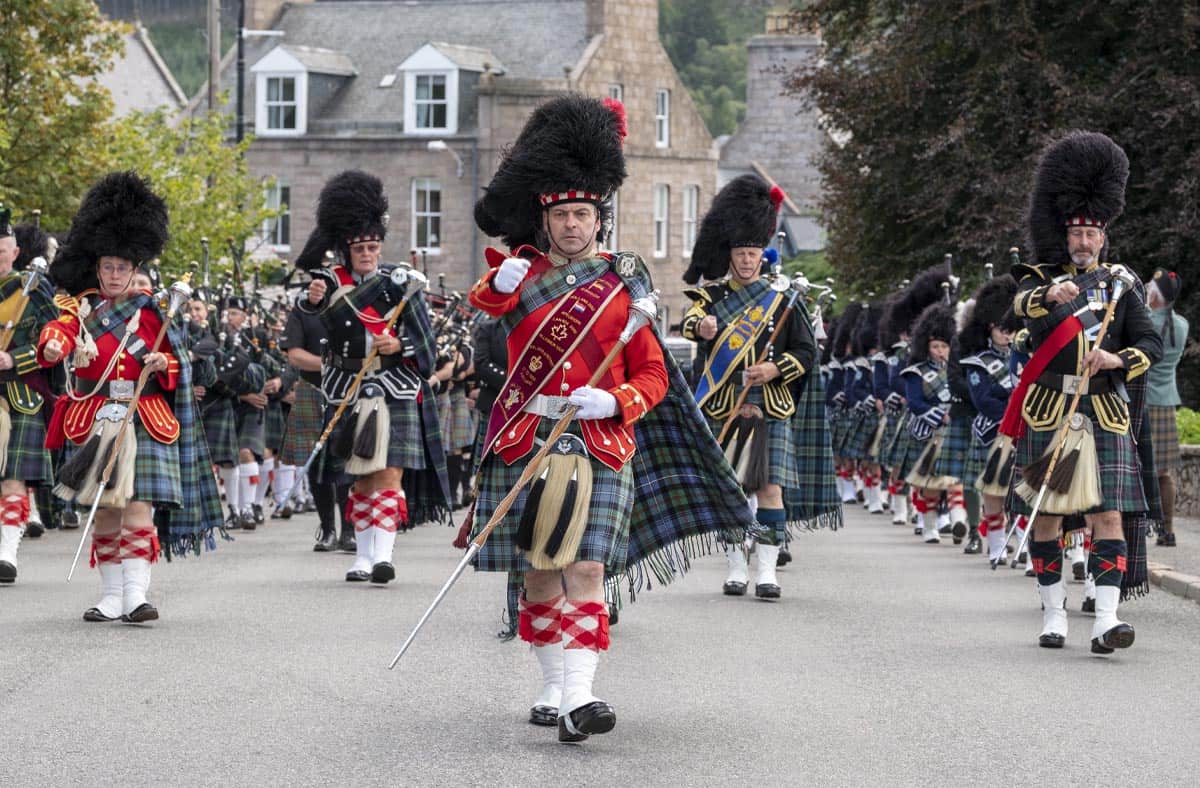 Drum major leading a marching band