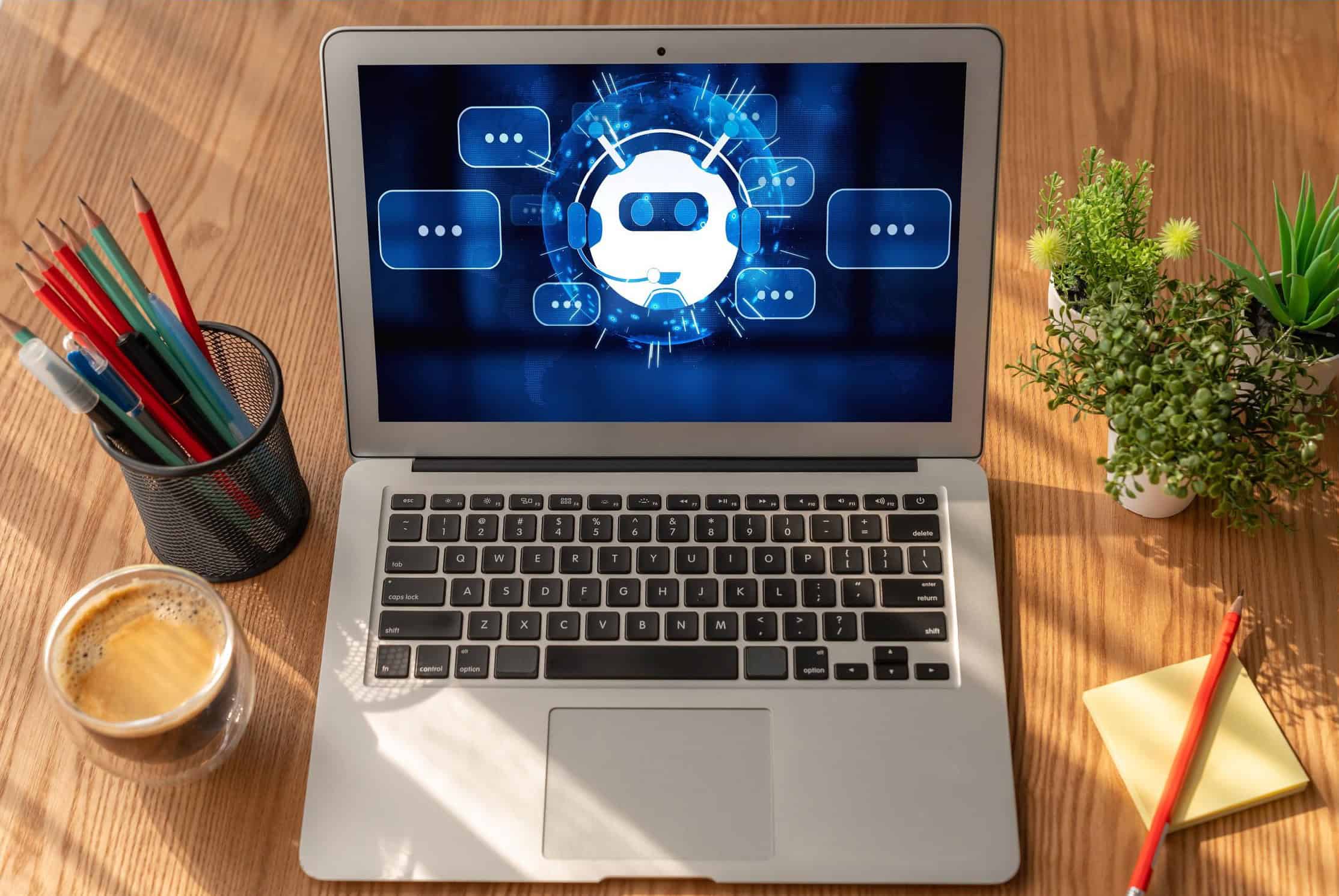 AI chatbot with a robotic face icon on a digital screen, concept of automated customer support technology.