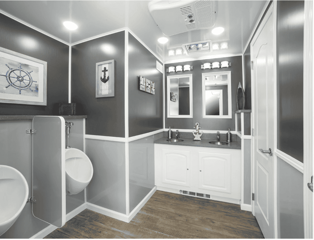 Modern luxury restroom trailer interior with elegant decor and fixtures.