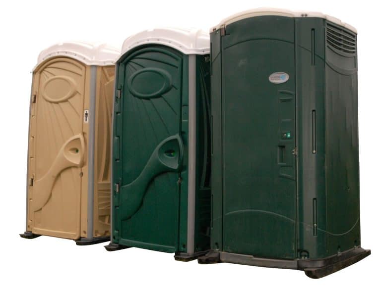 Portable toilet units in beige, green, and dark green for events and construction sites.
