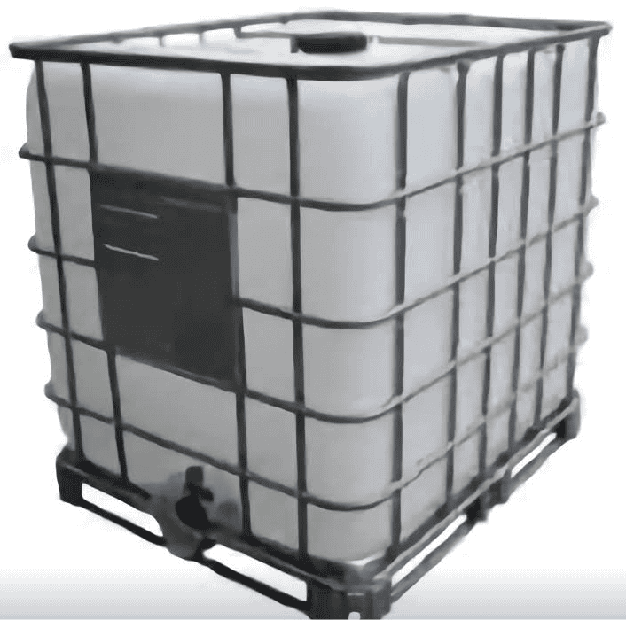 Large industrial water storage tank with metal cage and base for site services.