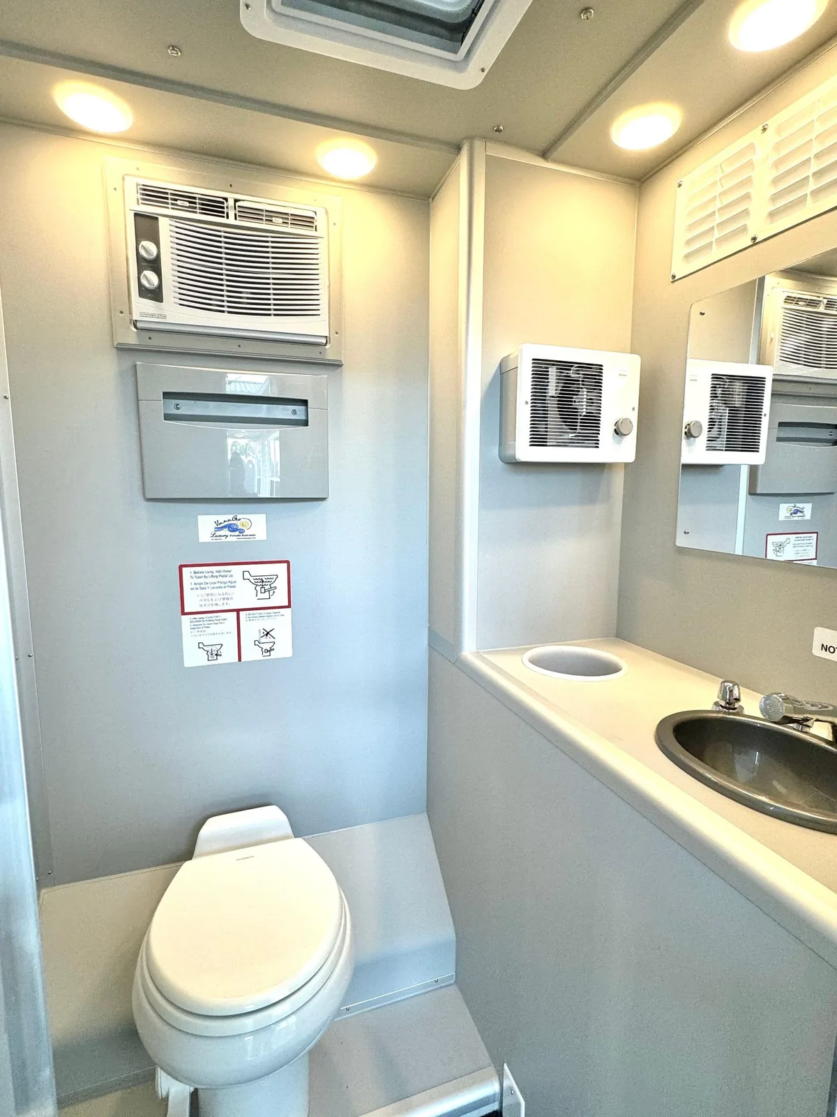 VannGo portable toilet pod staged on a commercial building site