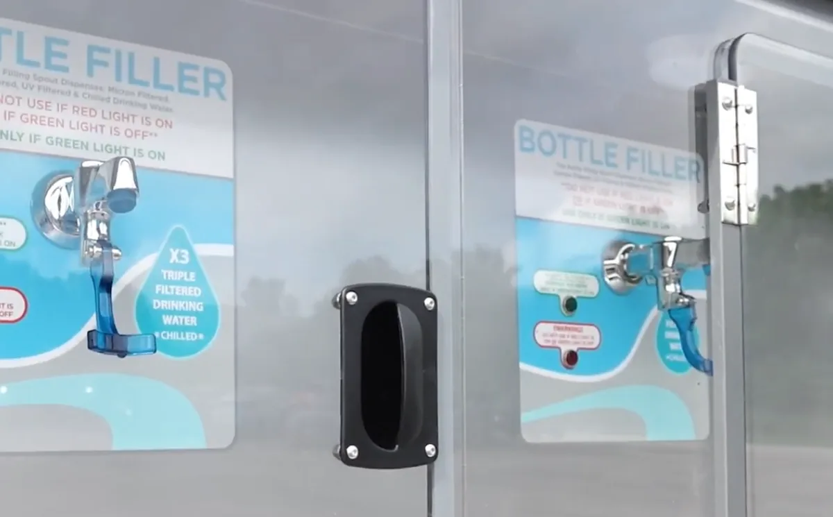 Close-up of a bottle filler station for triple filtered drinking water
