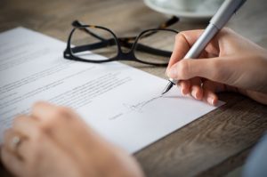 &nbsp;>thisisjustarandomplaceholder<Signing a form | Iberian Press®&nbsp;