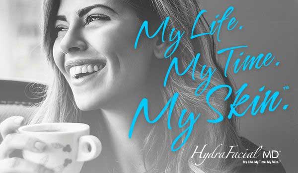 Smiling woman with coffee, HydraFacial advertisement text.