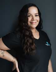 Chiara - Woman with long dark hair in black shirt