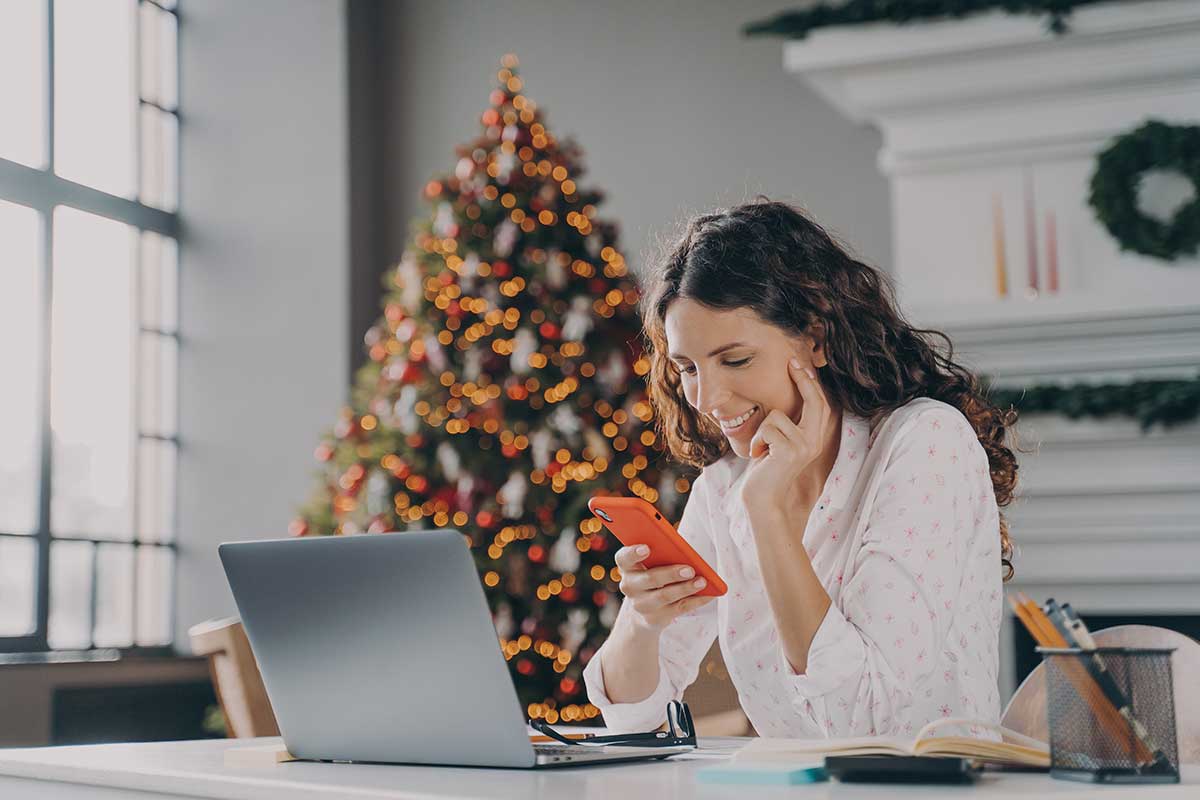 Happy Woman Shopping On Phone