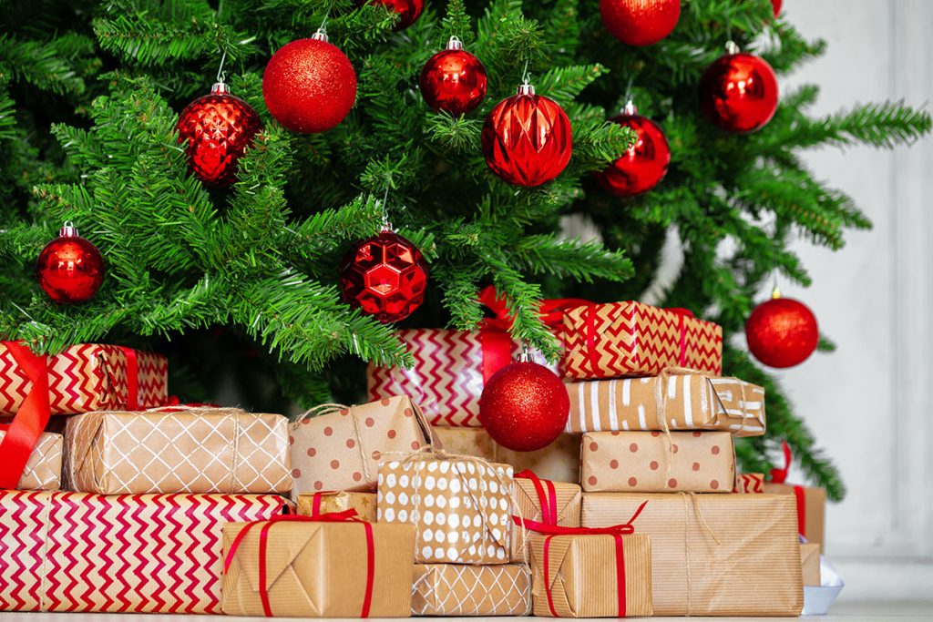 Stack Of Wrapped Presents Under Christmas Tree