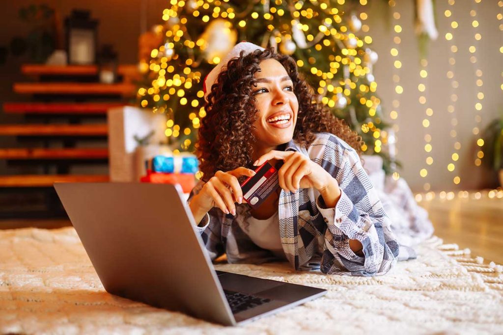 Woman Shopping Online During Christmas Season